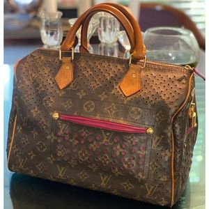 Authentic Louis Vuitton Fuchsia Perforated Speedy